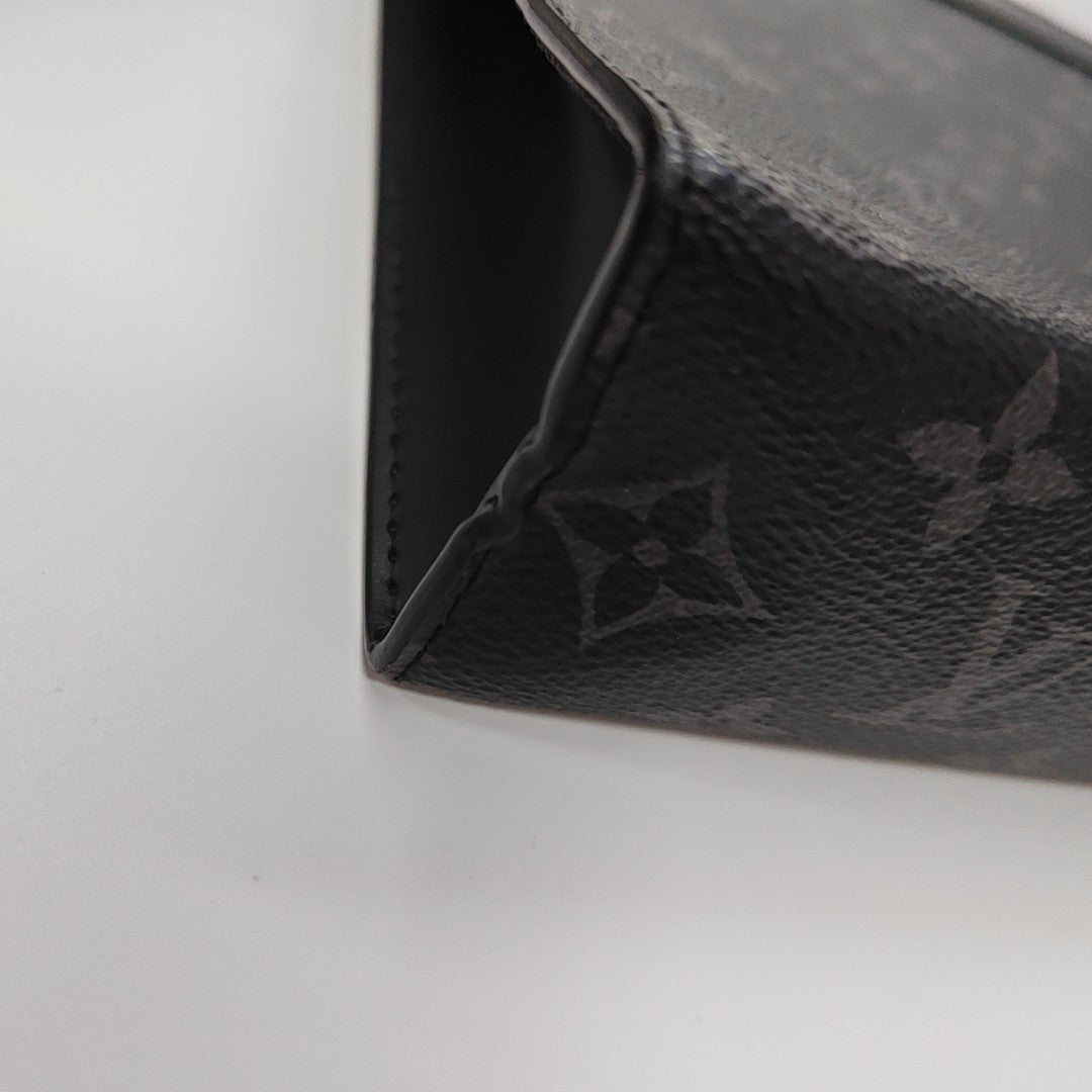 Pochette Voyag MM Monogram Coated Canvas Black