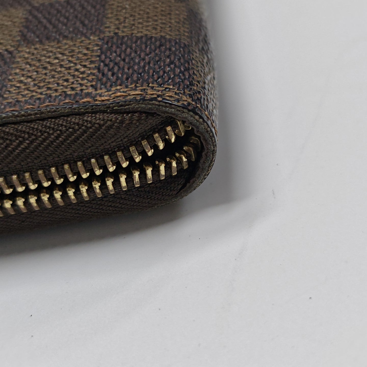 ZIPPY Damier Ebene Coated Canvas Brown Wallet