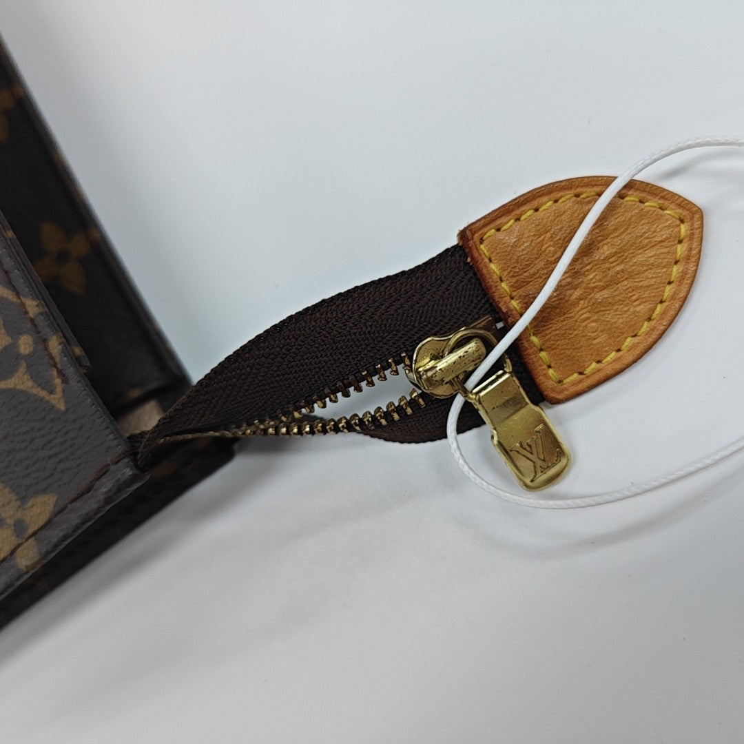 TOILET POCKET 26 Monogram Coated Canvas Brown