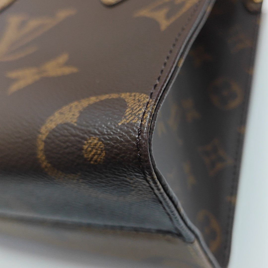 ONTHEGO PM Monogram Coated Canvas Brown