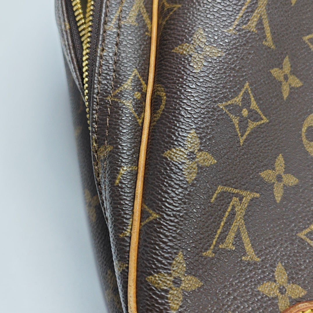 EXCURSION Monogram Coated Canvas Brown