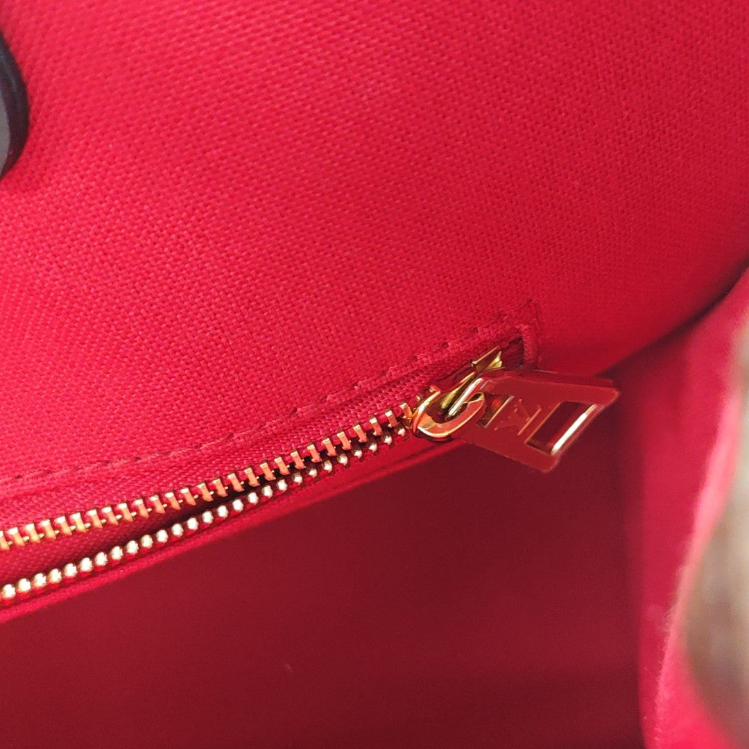 ONTHEGO MM Monogram Coated Canvas Brown