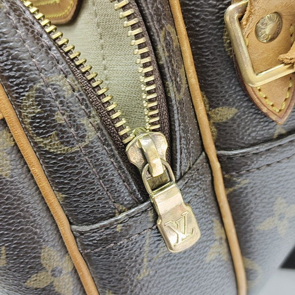 REPORTER Monogram Coated Canvas Brown