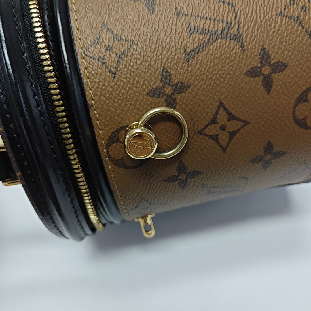 CANNES PM Monogram Coated Canvas Brown