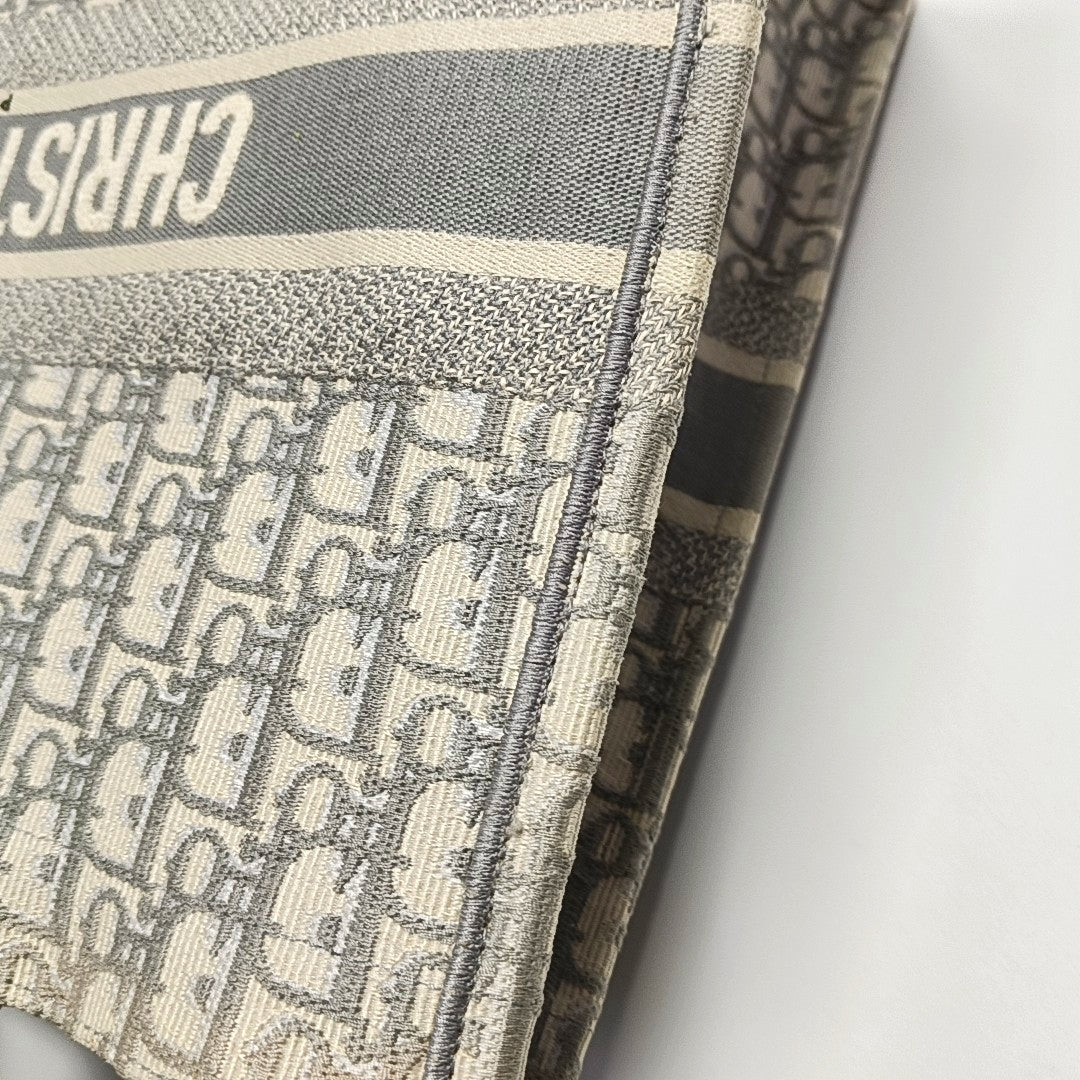 Authenticated pre-owned  Book Tote Large Monogram Canvas Grey - Tote Bag at Looply