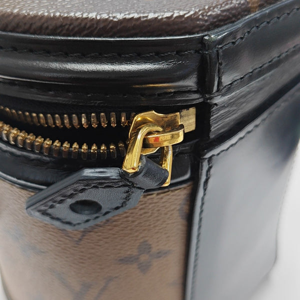 CANNES PM Monogram Coated Canvas Brown