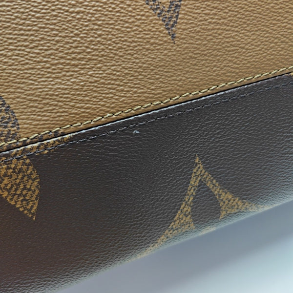ONTHEGO MM Monogram Coated Canvas Brown