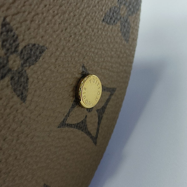 CANNES PM Monogram Coated Canvas Brown