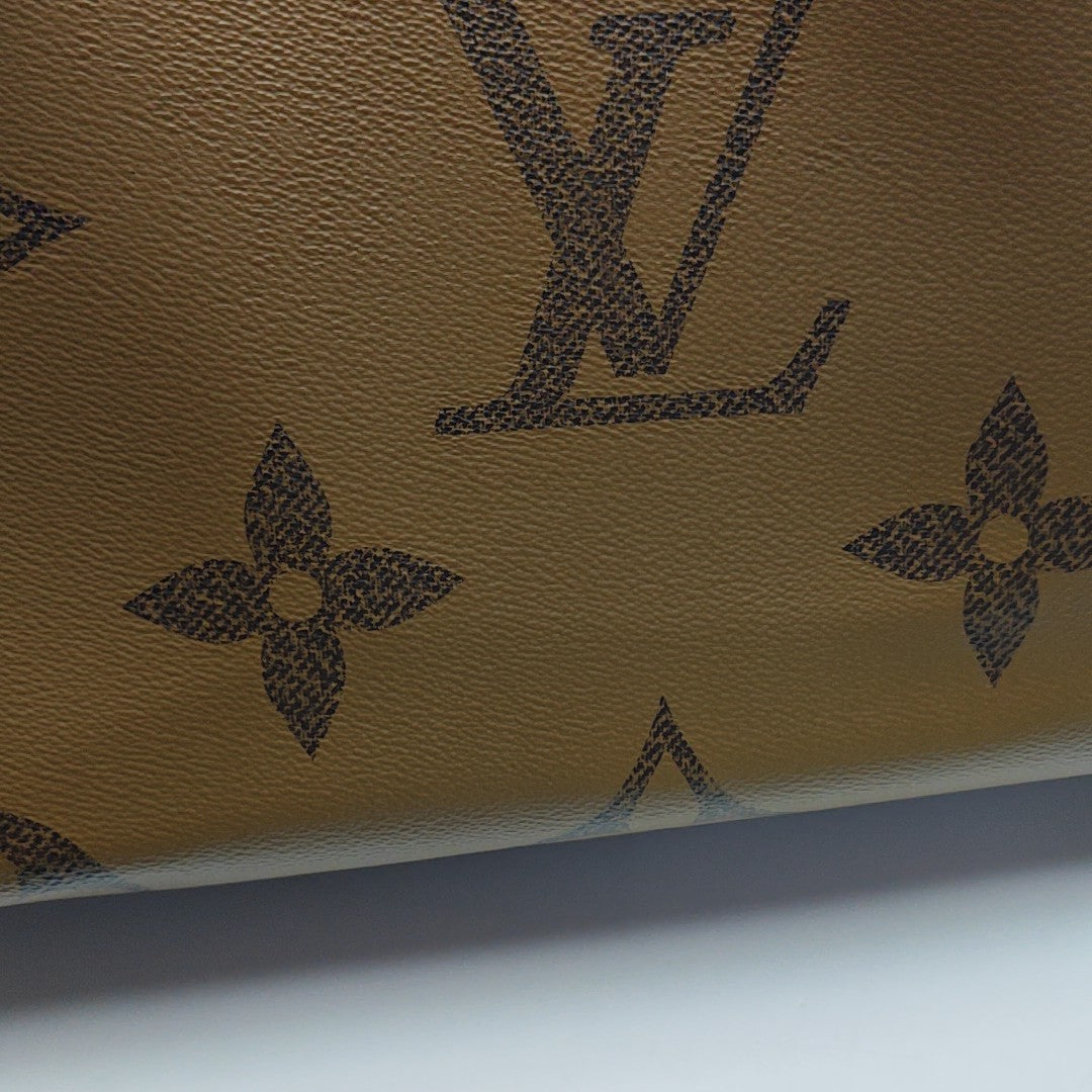 ONTHEGO GM Monogram Coated Canvas Brown