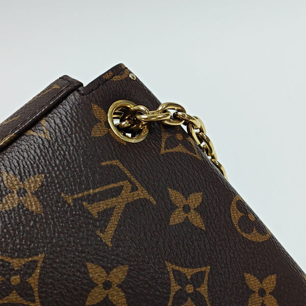 TRUNKIE Monogram Coated Canvas Brown