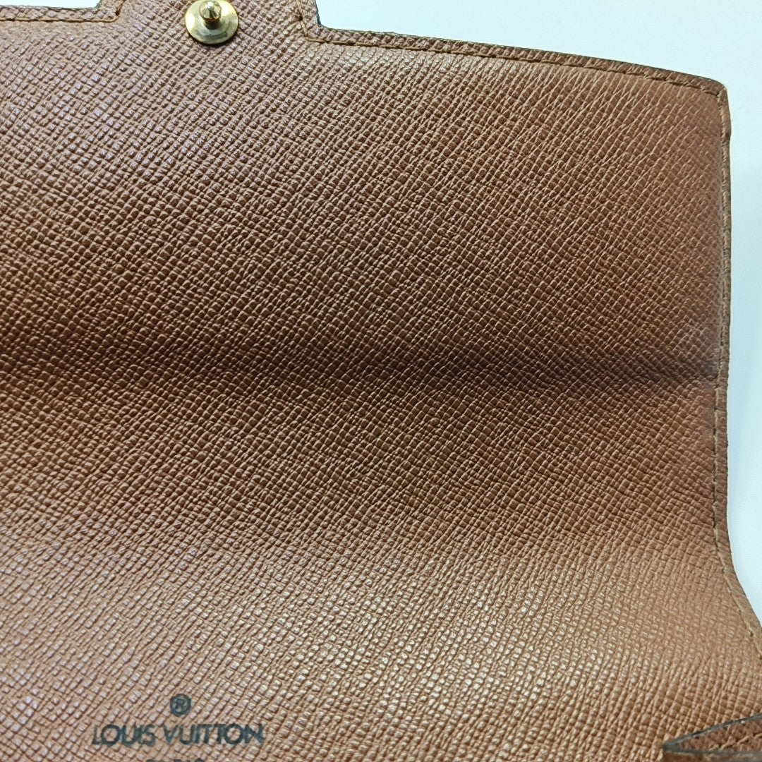 ARCHE Monogram Coated Canvas Brown