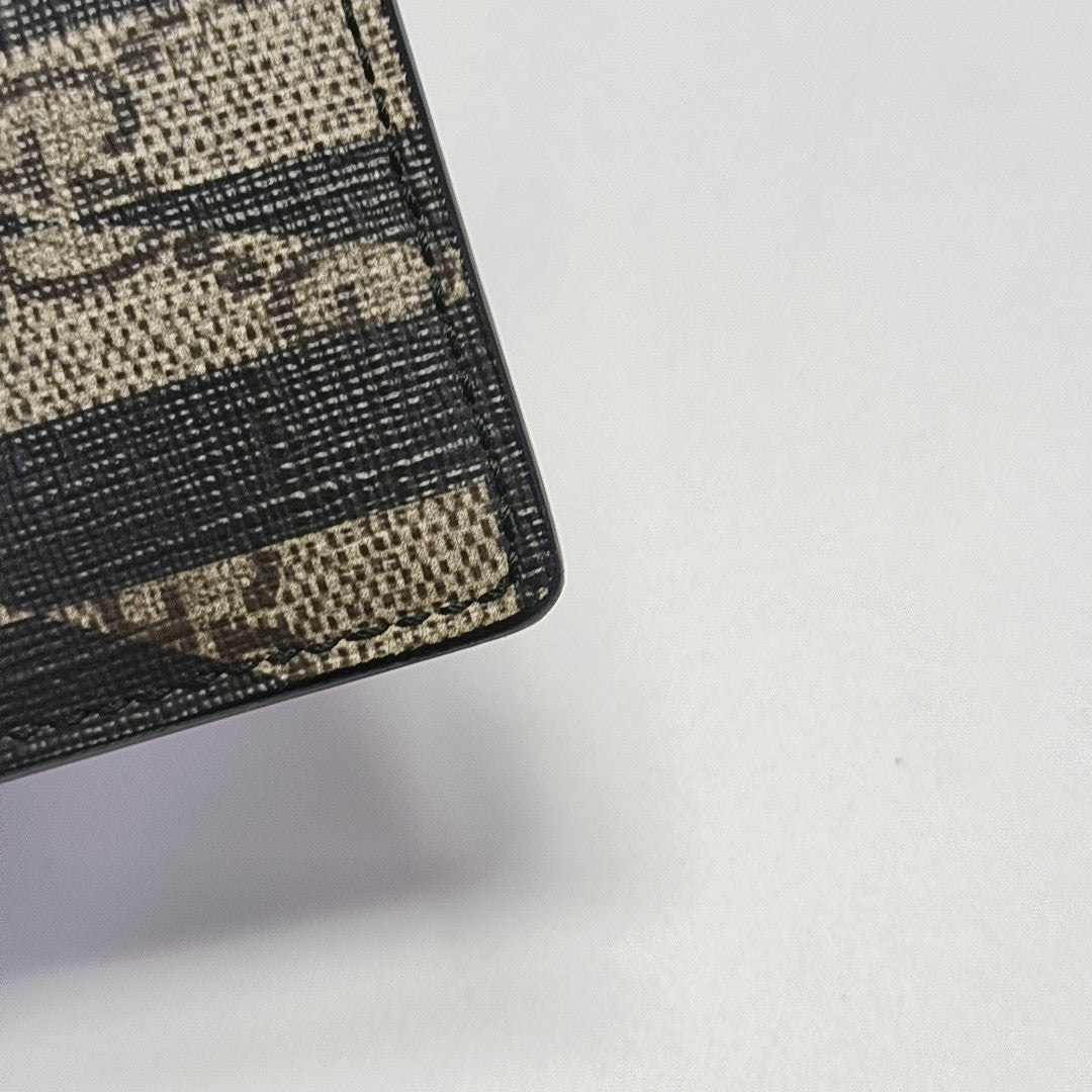 Monogram Coated Canvas Clutch Multicolor