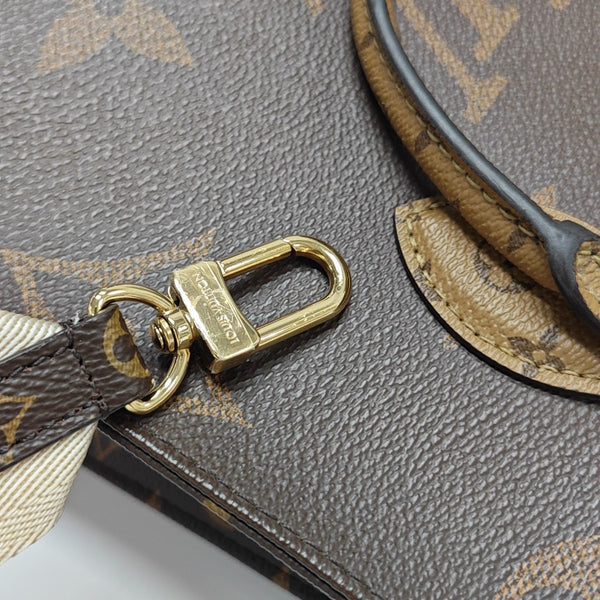 ONTHEGO PM Monogram Coated Canvas Brown
