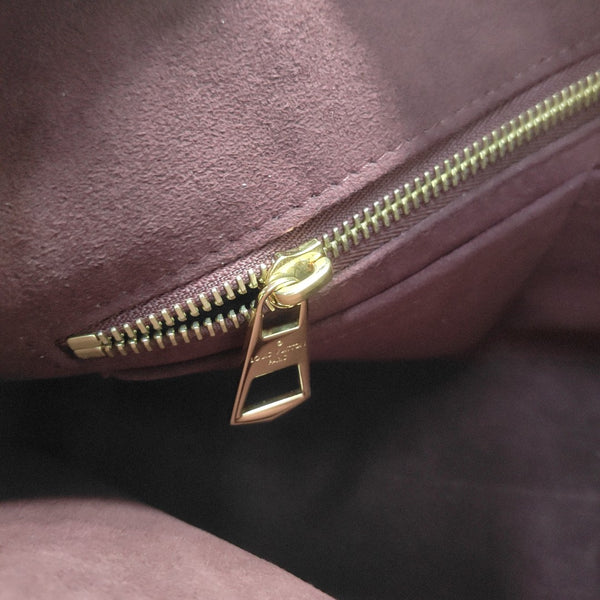 CARRYALL PM Monogram Coated Canvas Brown