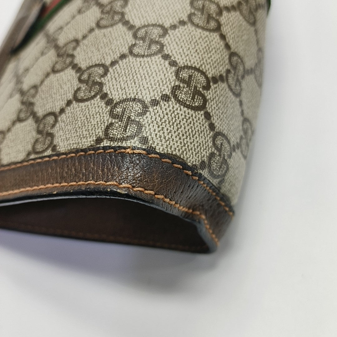 Monogram Coated Canvas Clutch Beige