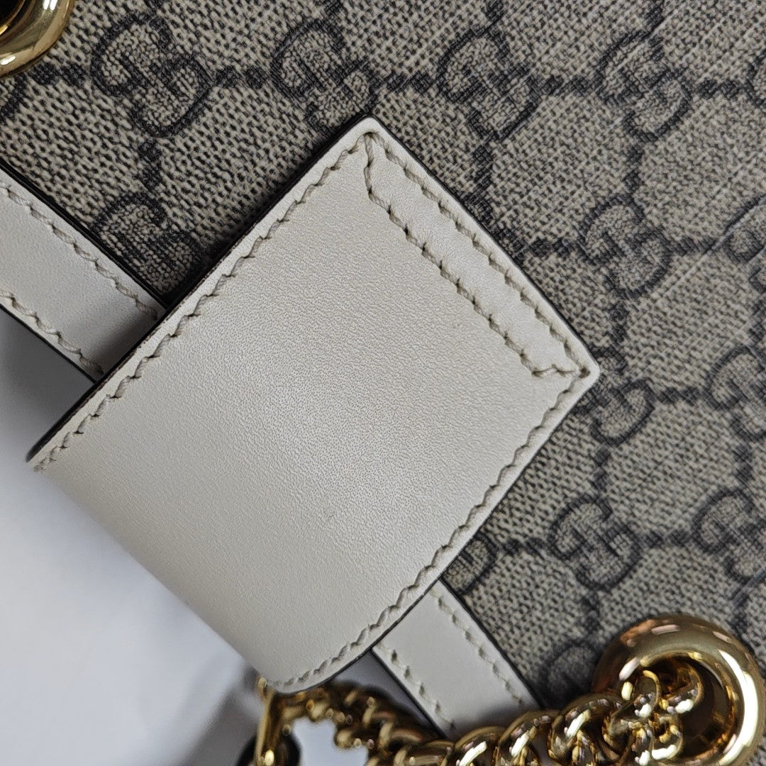 Padlock Small Monogram Coated Canvas Beige