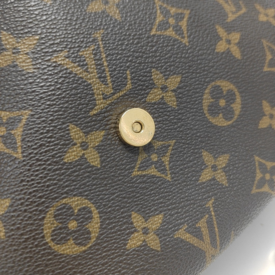 LOOPING PM Monogram Coated Canvas Brown