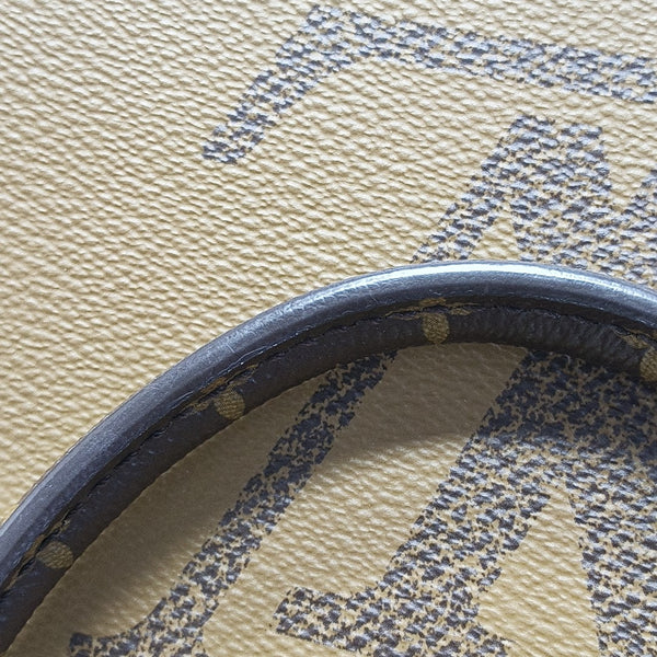 ONTHEGO MM Monogram Coated Canvas Brown