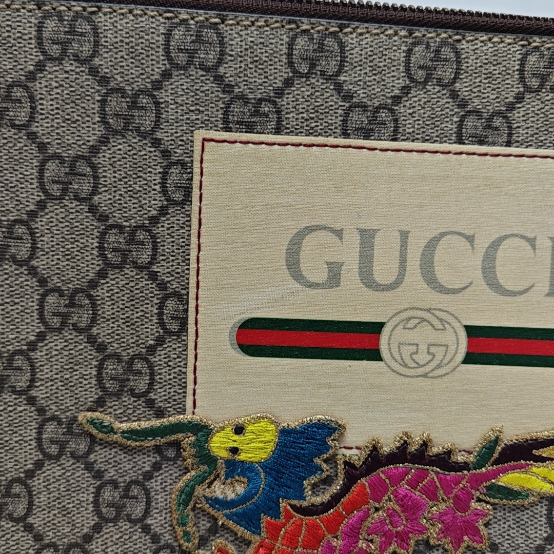 Monogram Coated Canvas Clutch Beige