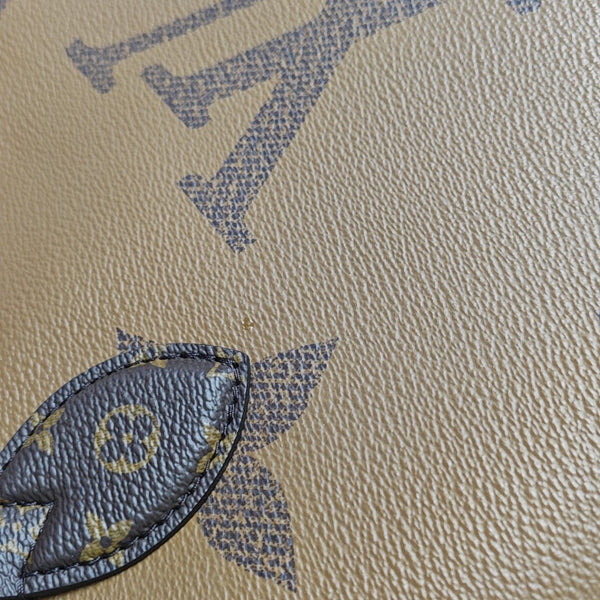 ONTHEGO MM Monogram Coated Canvas Brown