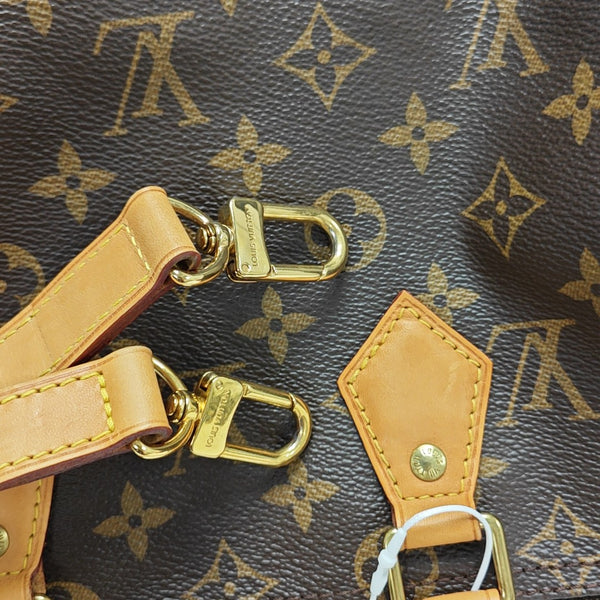 SPEEDY 25 Monogram Coated Canvas Brown