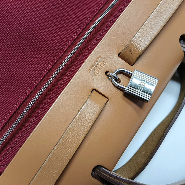 Authenticated pre-owned  Herbag 31 Canvas Red - Shoulder Bag at Looply