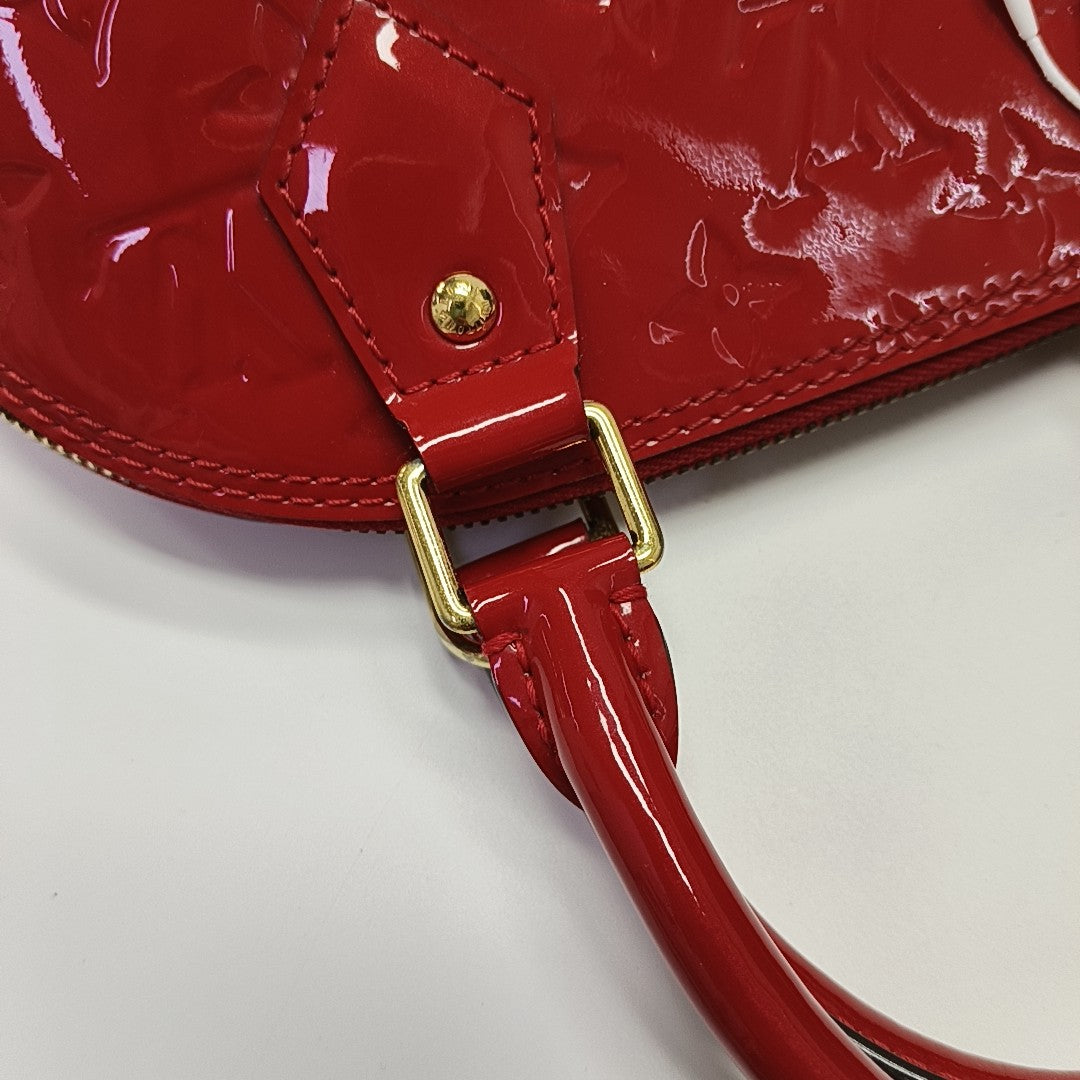 ALMA BB Monogram Patent Leather Red