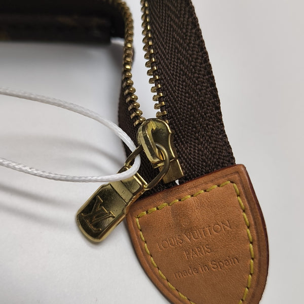 TOILET POCKET 26 Monogram Coated Canvas Brown
