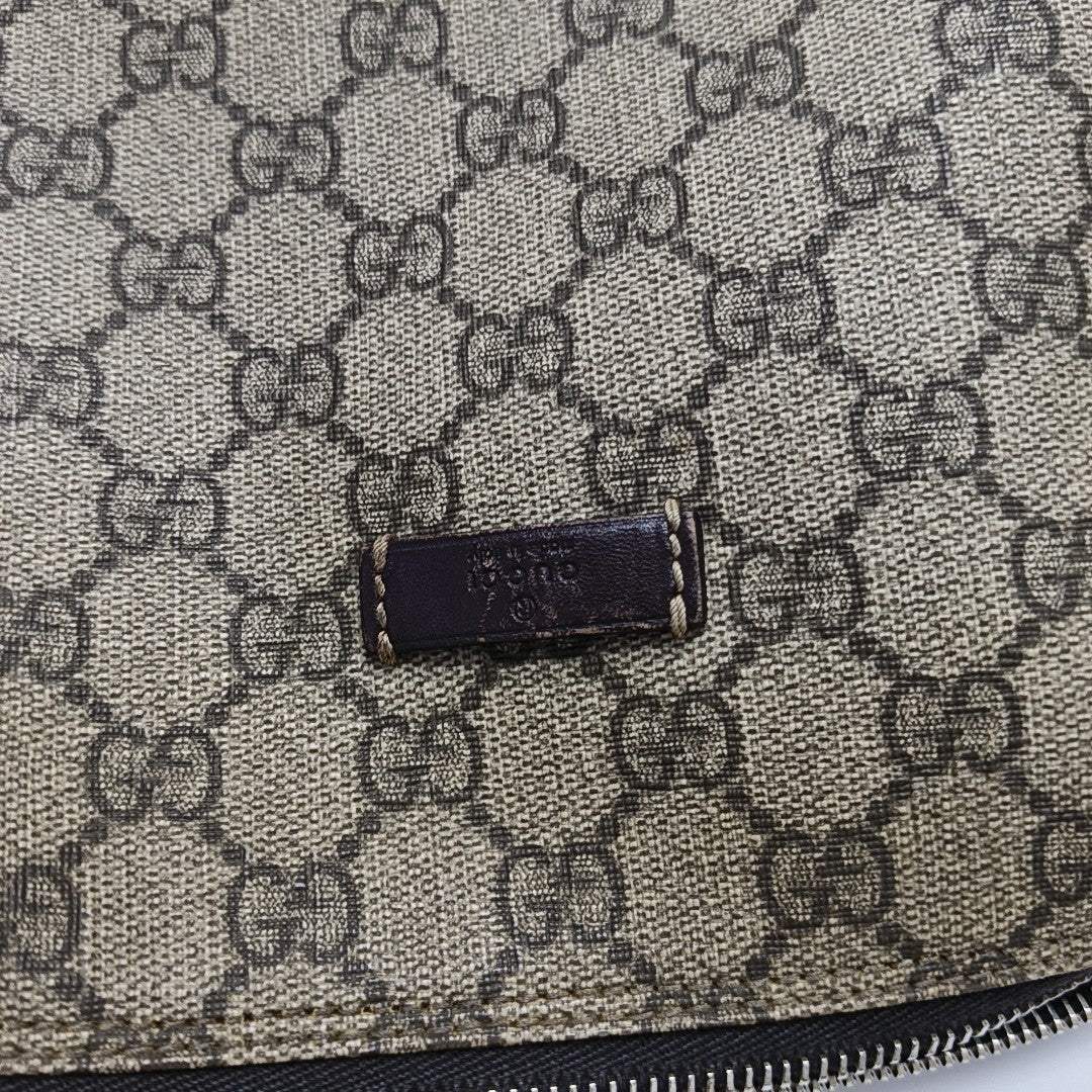 Monogram Coated Canvas Clutch Brown