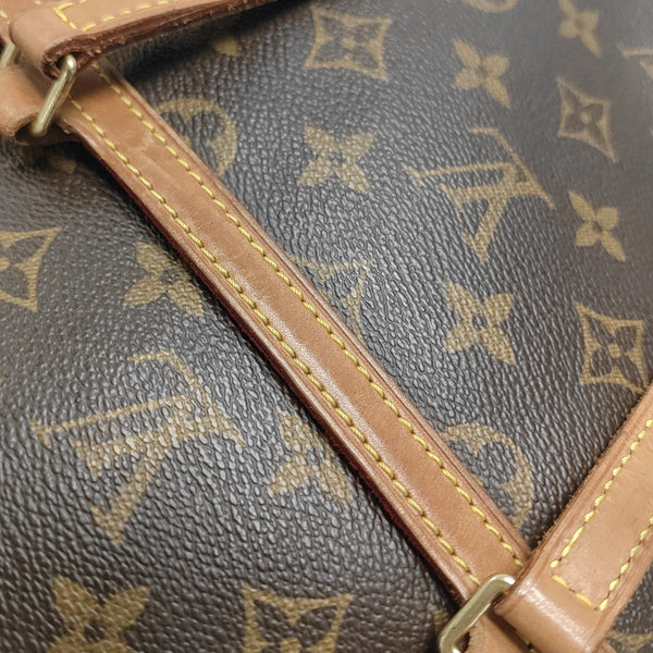 COUSSIN GM Monogram Coated Canvas Brown