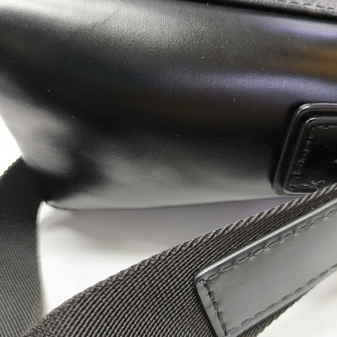 VOYAGER PM Monogram Coated Canvas Black
