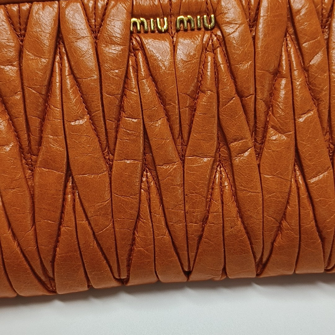 Quilted Lambskin Clutch Orange