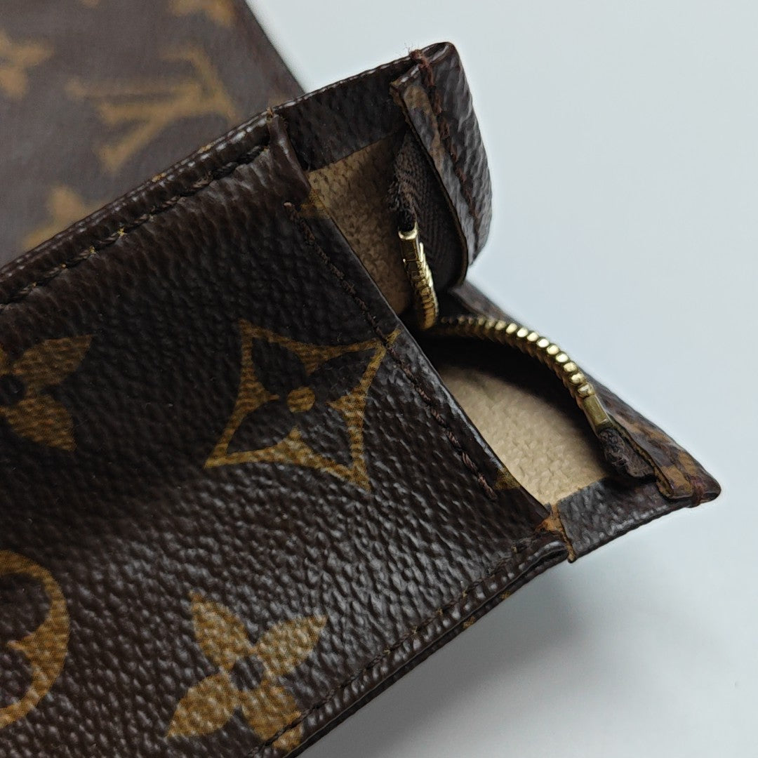 TOILET POCKET 26 Monogram Coated Canvas Brown
