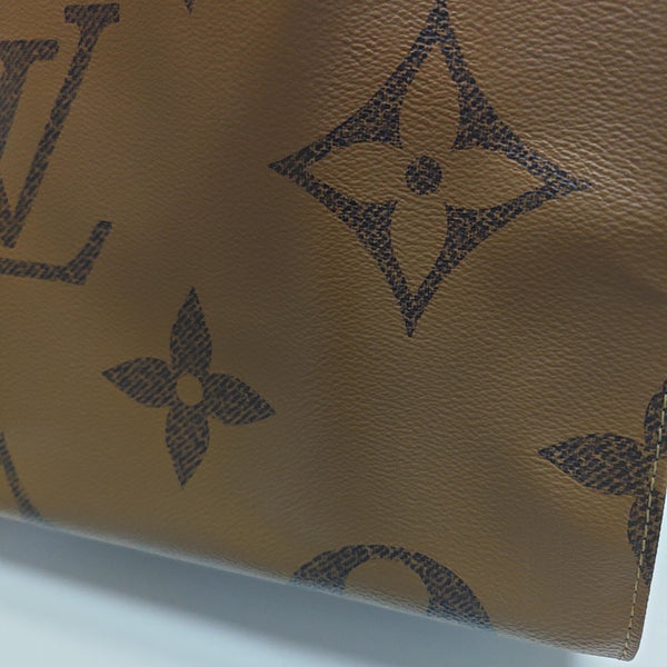 ONTHEGO GM Monogram Coated Canvas Brown