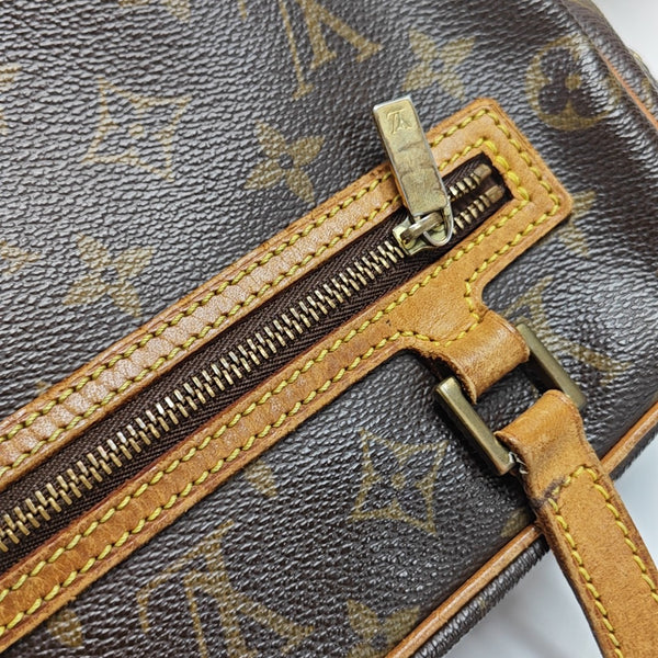 CITE Monogram Coated Canvas Brown