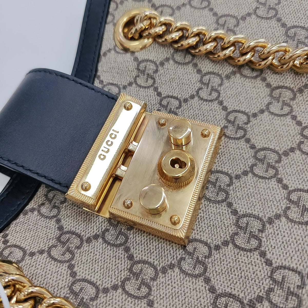 Padlock Small Monogram Coated Canvas Beige