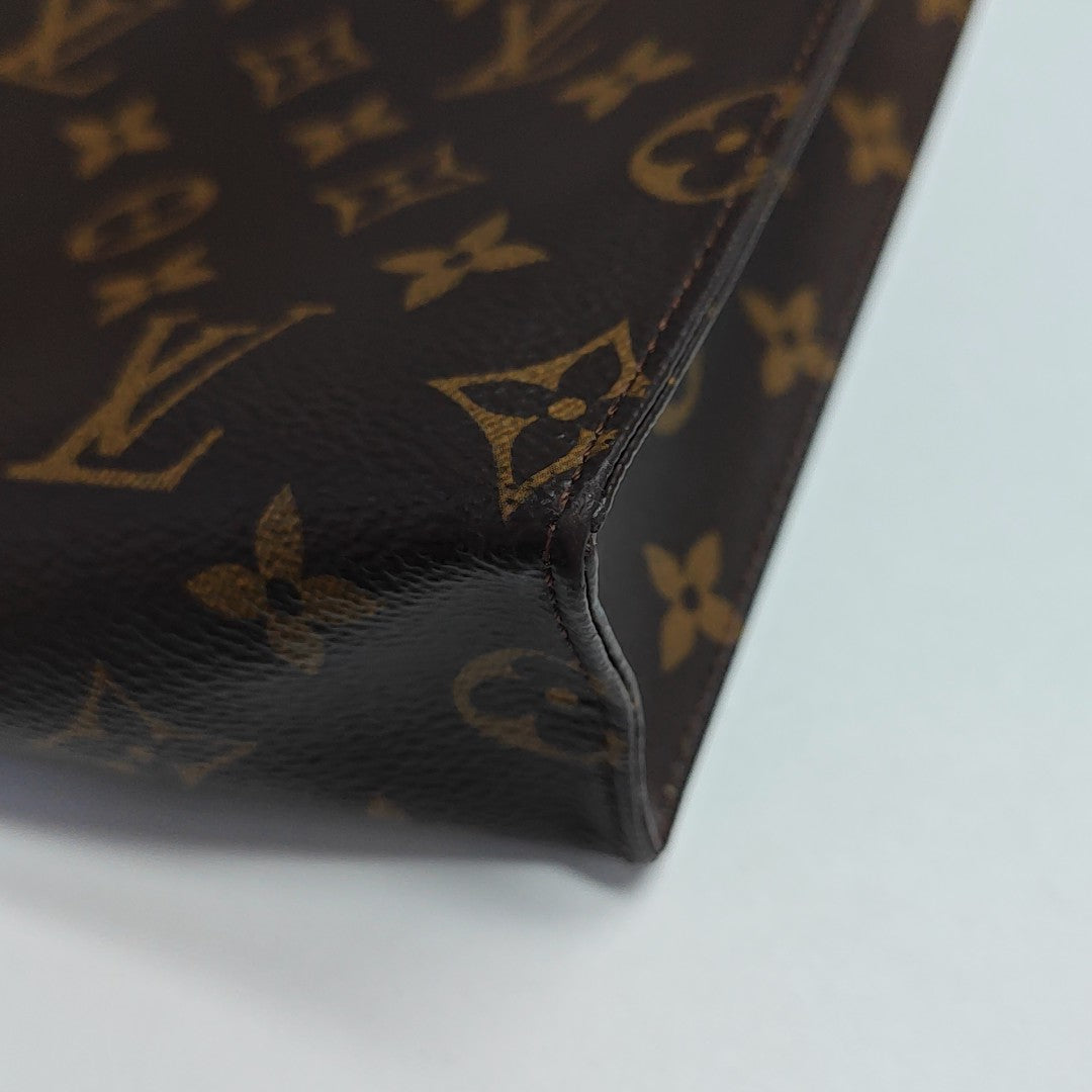 TOILET POCKET 26 Monogram Coated Canvas Brown