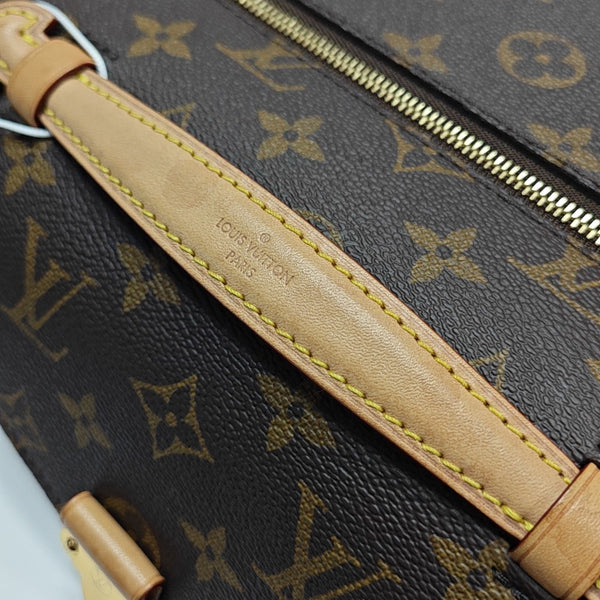 MÉTIS EAST WEST Monogram Coated Canvas Brown
