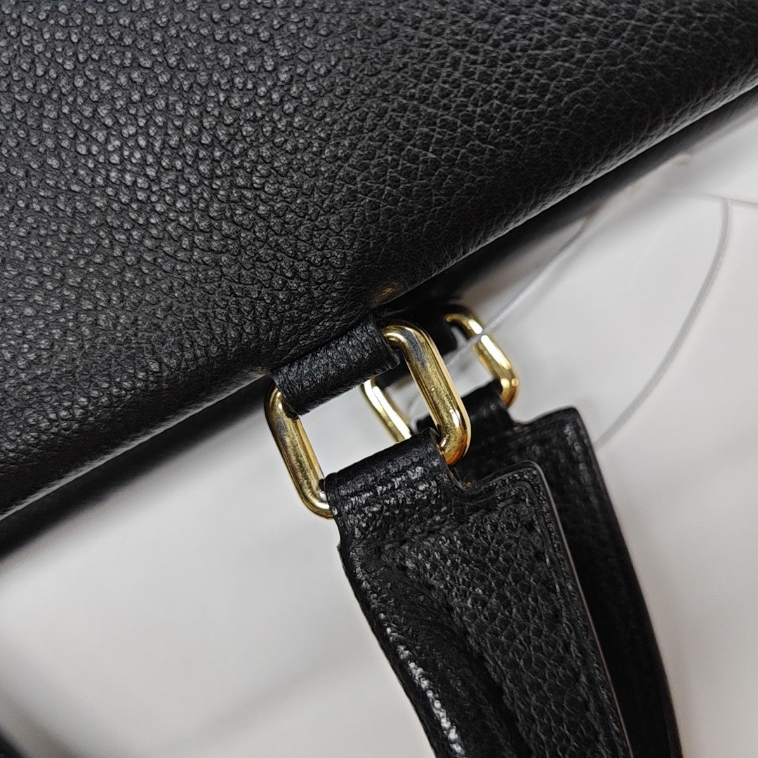 VÉNUS Monogram Coated Canvas Brown