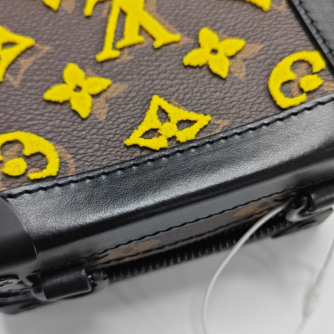 SOFT TRUNK Monogram Coated Canvas Yellow