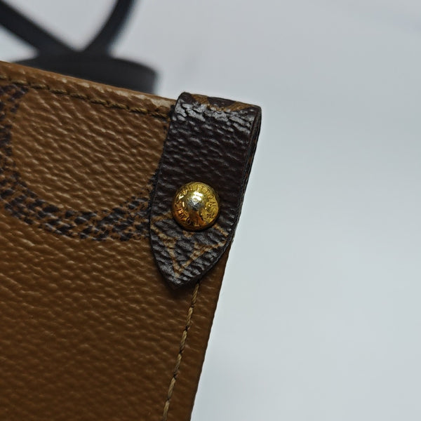 ONTHEGO MM Monogram Coated Canvas Brown