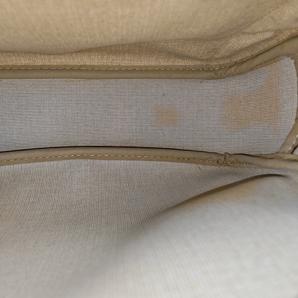 REPORTER Monogram Coated Canvas Brown