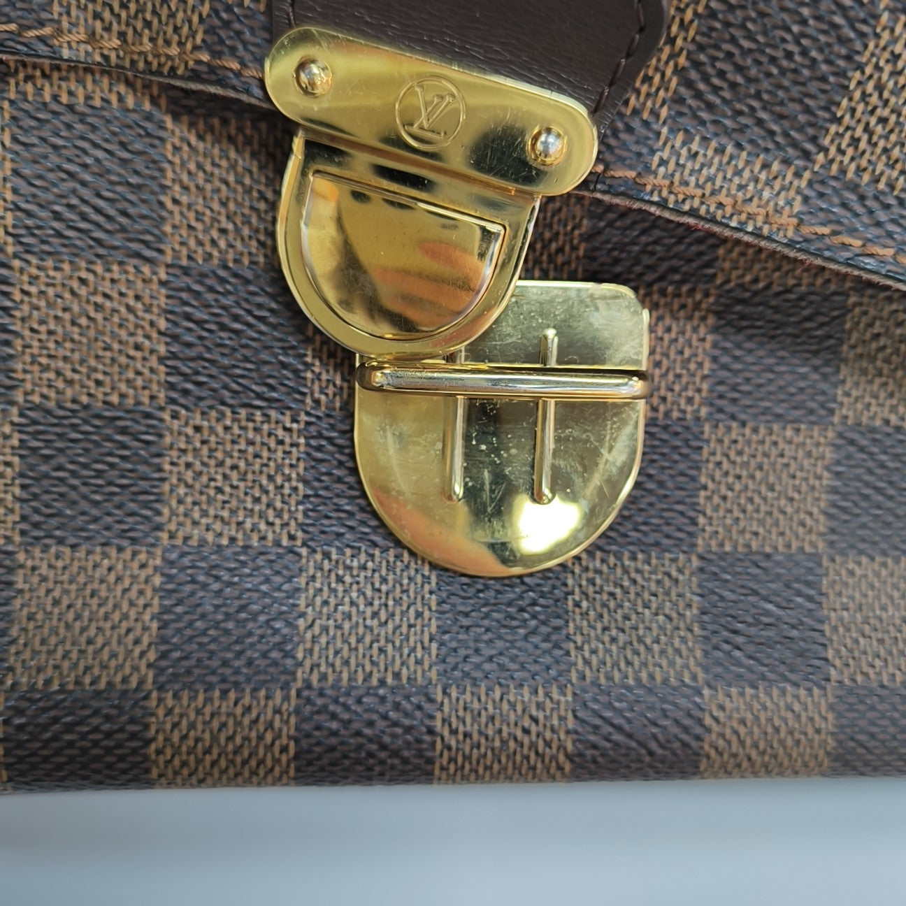 RAVELLO GM Damier Ebene Coated Canvas Brown