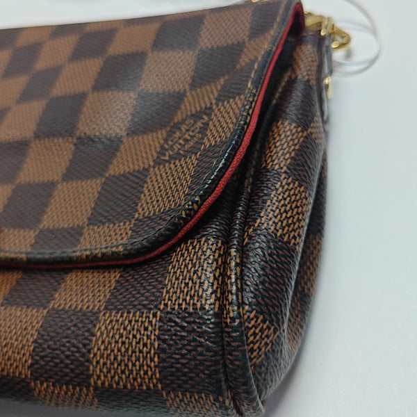 FAVORITE PM Damier Ebene Coated Canvas Brown