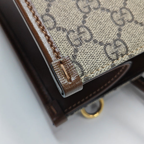 Retro Small Monogram Coated Canvas Brown