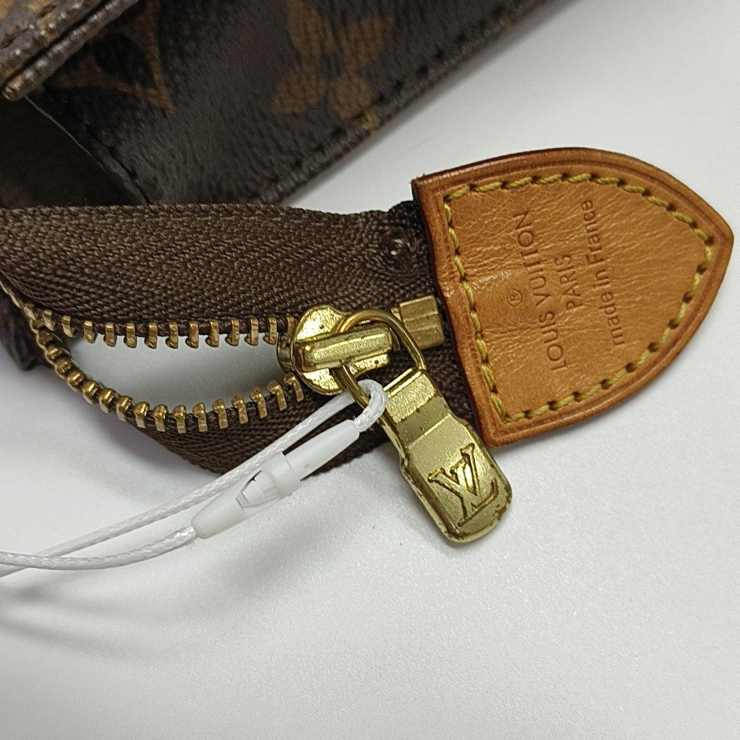 TOILET POCKET 26 Monogram Coated Canvas Brown