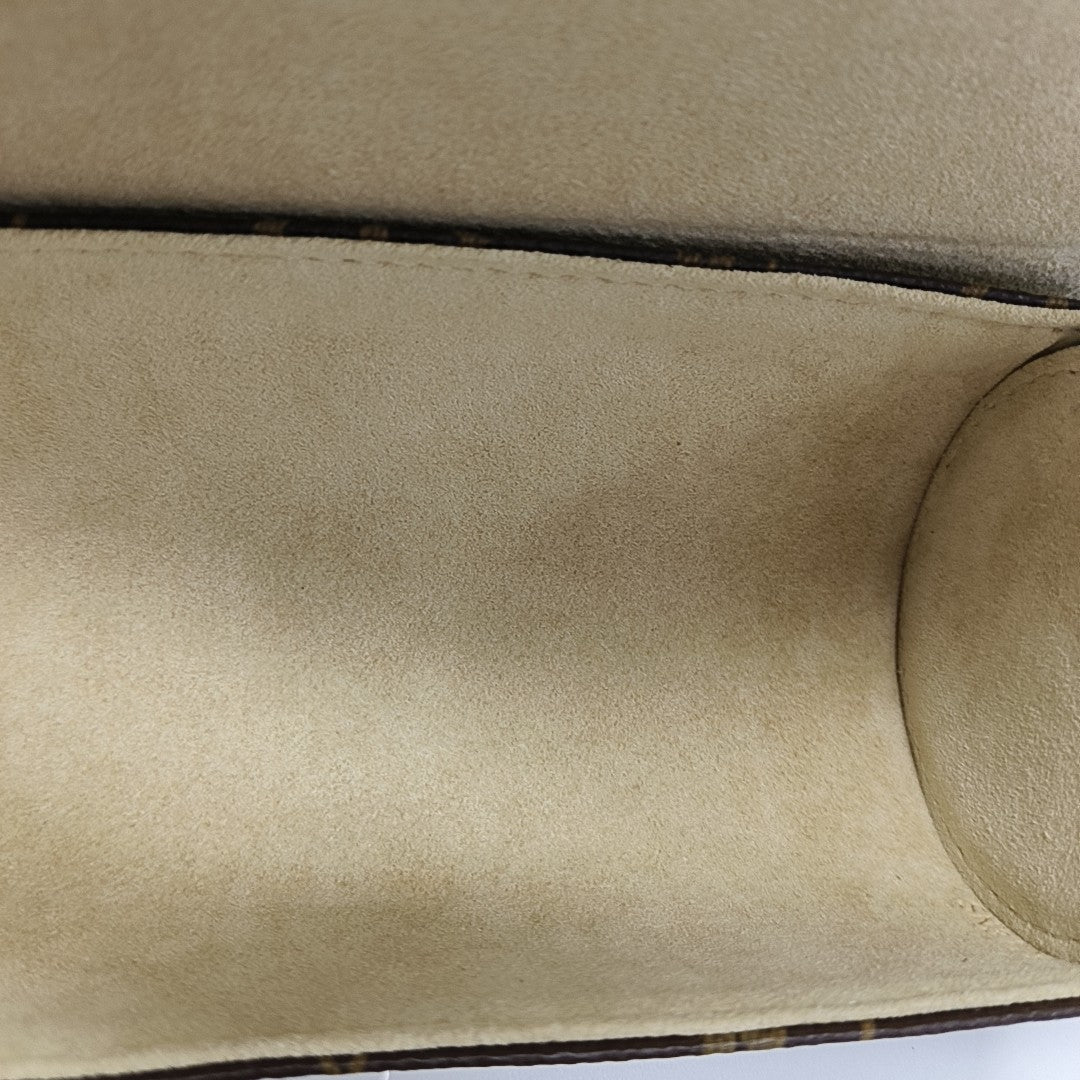Monogram Coated Canvas Clutch Brown