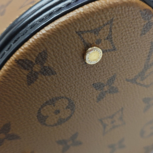 CANNES PM Monogram Coated Canvas Brown
