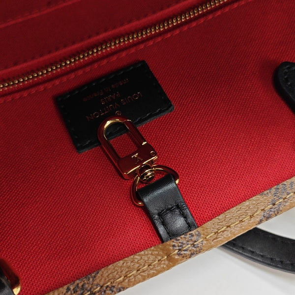 ONTHEGO MM Monogram Coated Canvas Brown