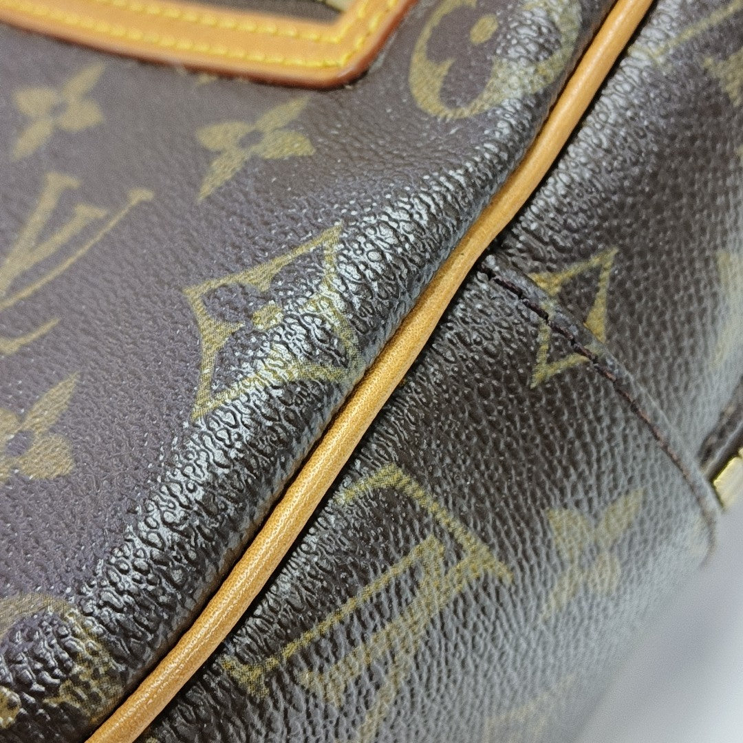 CITE MM Monogram Coated Canvas Brown